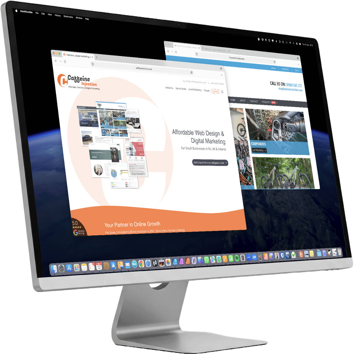 A desktop computer monitor displaying a colourful website wireframe, representing the website design process.